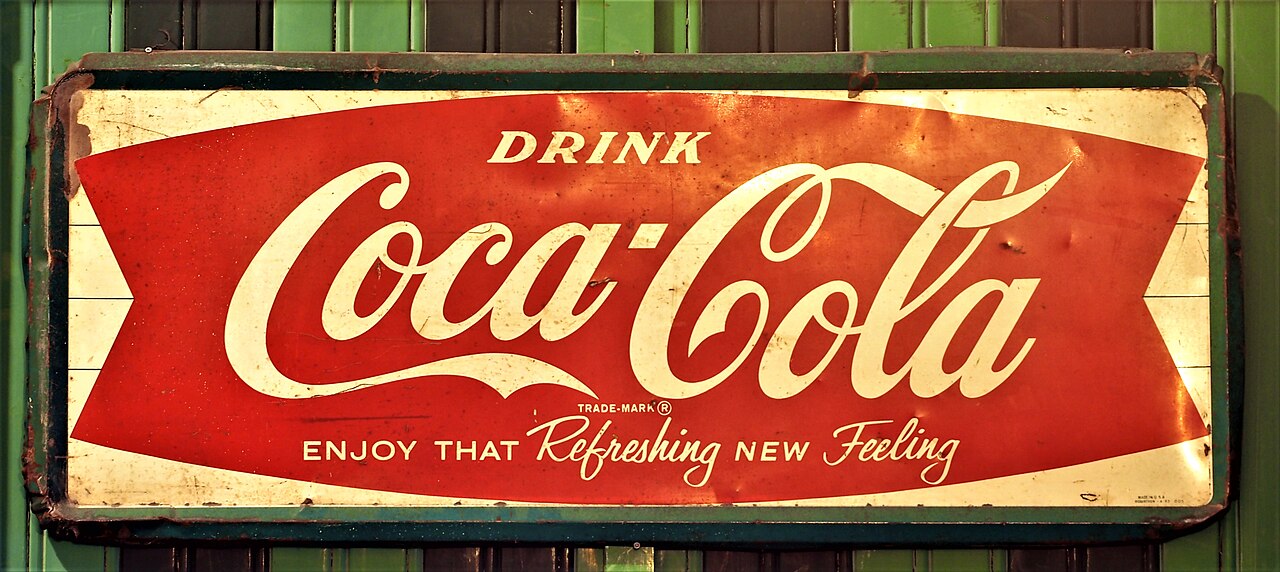 Histoire du logo Coca‑Cola : Spencerian et enseignes émaillées